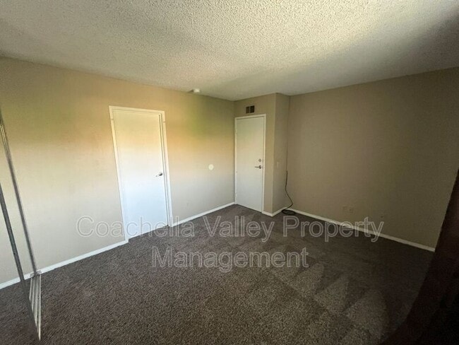 Building Photo - 1950 S Palm Canyon Dr