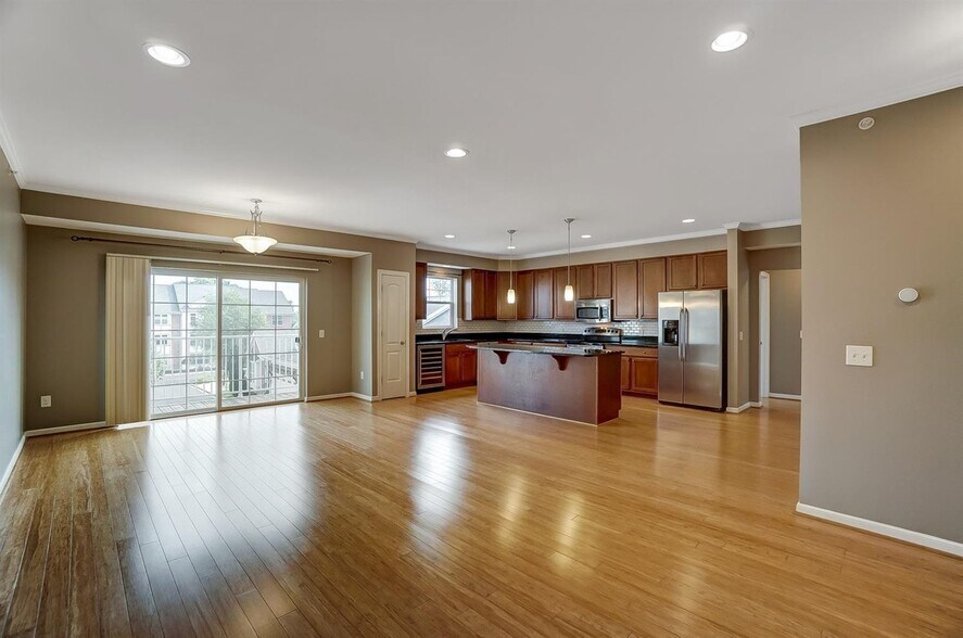 Open kitchen with granite countertops and updated appliances (fridge, oven, dishwasher, sink) - 3316 Wasson Rd