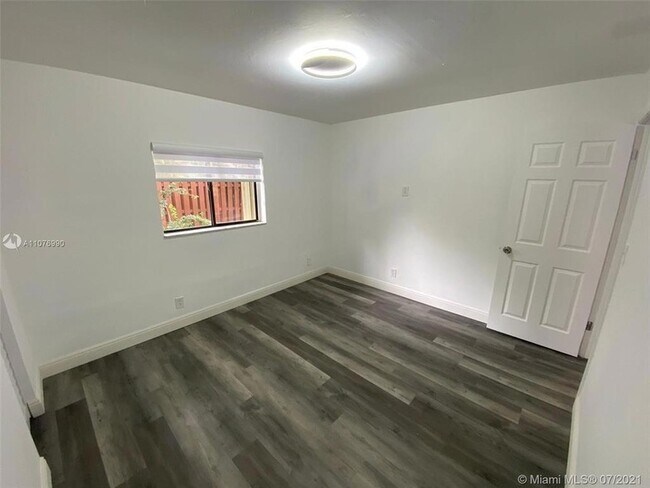 Building Photo - 9658 NW 28th Ct