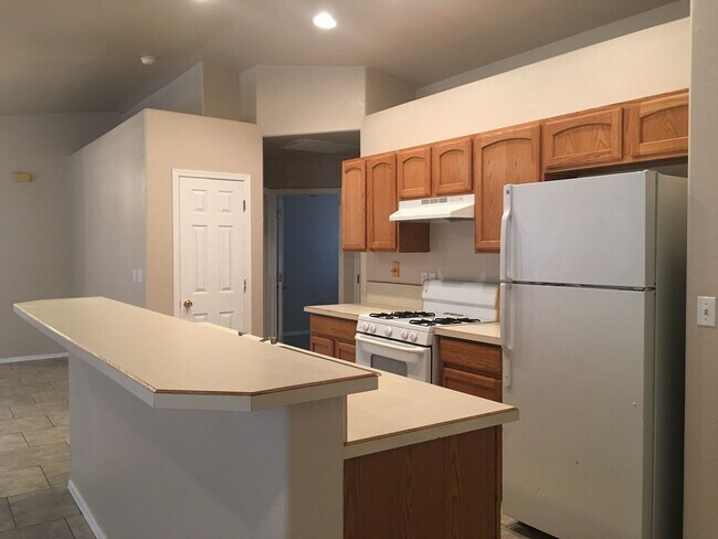 Building Photo - 3-Bedroom Single Family Home with Central Cooling, Attached Garage, and Tile Flooring