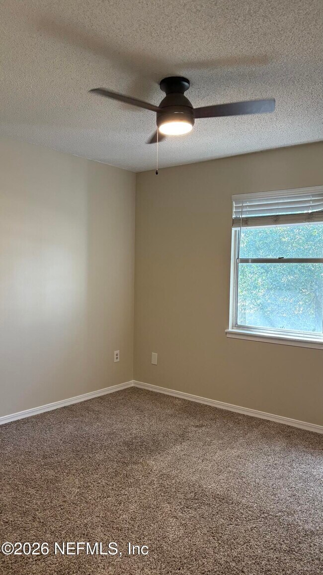 Building Photo - 11467 Fort Caroline Lakes Dr N