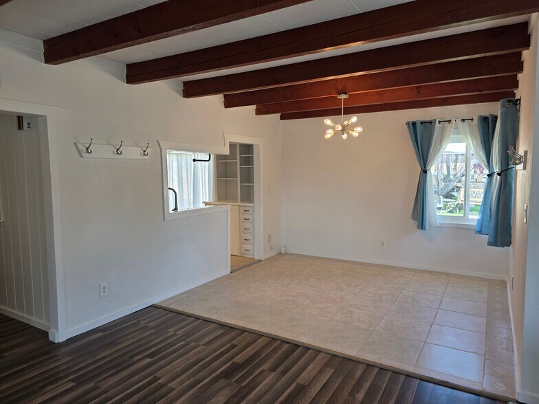 Close up of dining room, with view into kitchen. We love these “windows” from the kitchen. - 456 E Indian Rock Rd