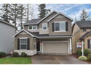 Building Photo - Bright and Open Floor Plan with Fireplace, Attached Garage & Vaulted Ceilings