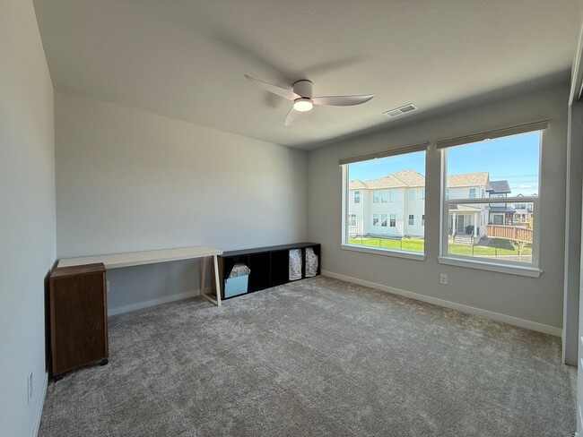 Building Photo - Stunning Luxury Living in Coal Creek with ...