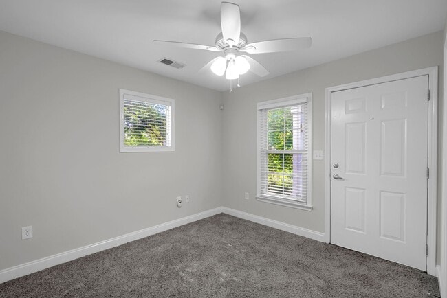 Building Photo - Wonderful craftsman style end-unit townhome