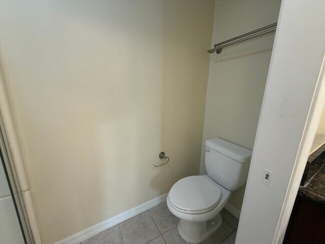Building Photo - Upgraded Condo with Private Patio, AC, Pool, Gym, and Covered Parking in Gated Community