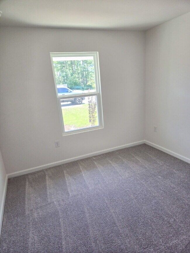 Building Photo - Welcome to your brand-new home in the Mallard Landing conveniently located to NAS Pensacola! INTE...