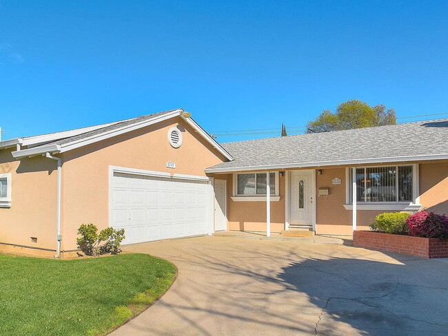 Building Photo - An attractive 3 bedroom, 2 bath, 1352 square foot home is now available for rent