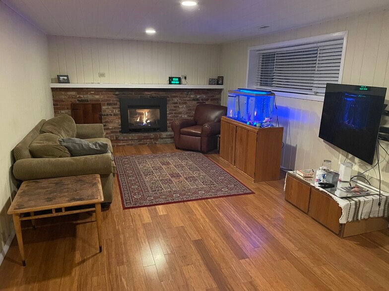 Livingroom with gas fireplace - 22908 54th Ave W