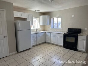 Building Photo - Available Now - Charming Upper-Level Unit ...