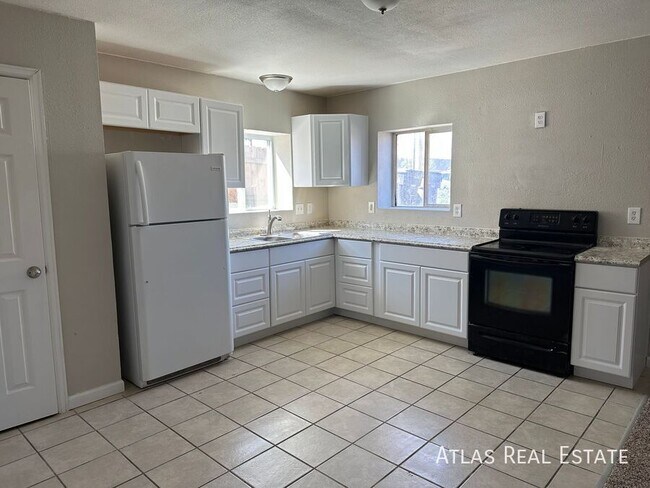 Primary Photo - Available Now - Charming Upper-Level Unit ...