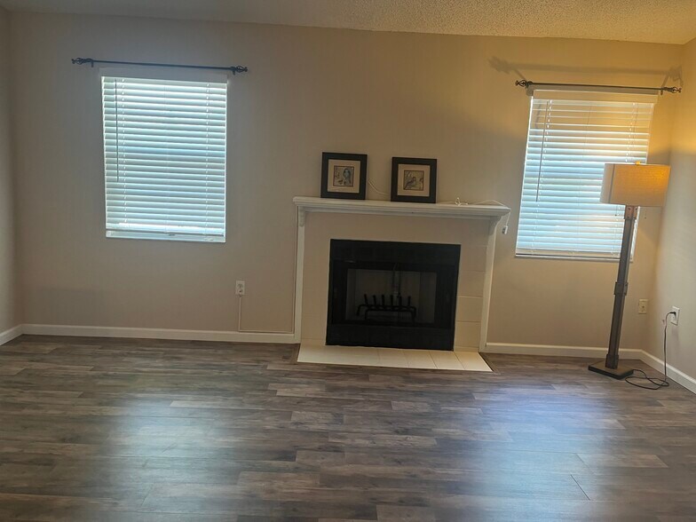 Living room with fireplace - 3782 59th Ave W