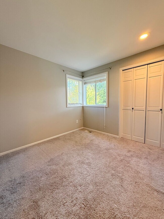 Building Photo - Beautiful 4-Bedroom Home with Expansive Deck & 3-Car Garage – Minutes to Mill Creek Town Center