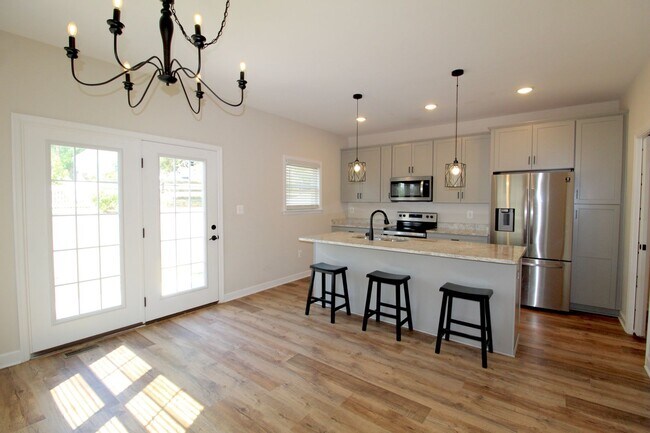 Building Photo - Spacious 4 Bedroom, 3.5 Bath Townhome with...