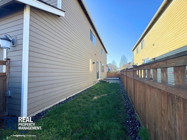 Building Photo - Spacious 4-Bedroom Home with Fenced Yard & 2-Car Garage Near JBLM!