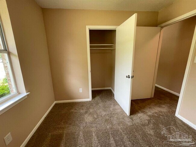 Building Photo - 6975 Woodley Dr