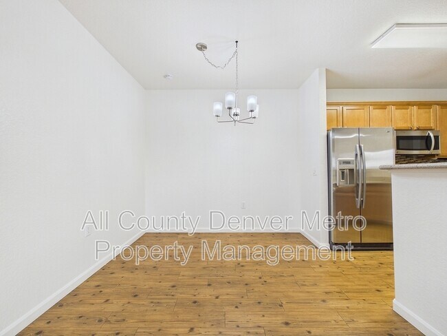 Building Photo - 10239 W 55th Dr