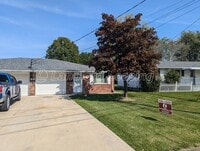 Building Photo - Beautifully Maintained Brick Duplex
