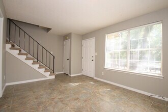 Building Photo - Southwest Pensacola Townhome Near NAS Pensacola with Granite Kitchen & Privacy-Fenced Patio