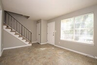 Building Photo - Southwest Pensacola Townhome Near NAS Pensacola with Granite Kitchen & Privacy-Fenced Patio
