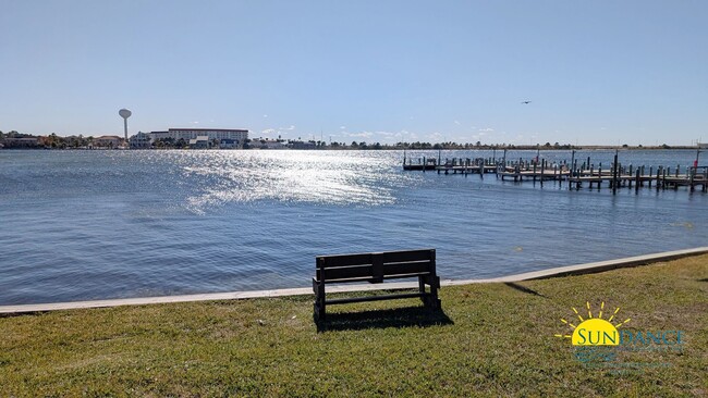 Building Photo - Expansive waterfront covered patio off thi...