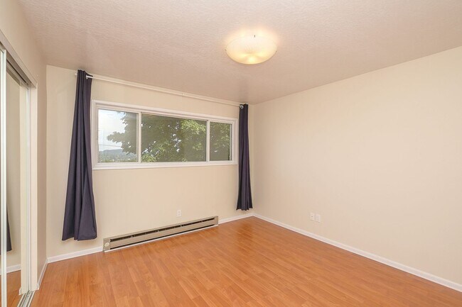 Building Photo - Updated 2 Bedroom, 1 Bathroom Condominium With Stunning Views.