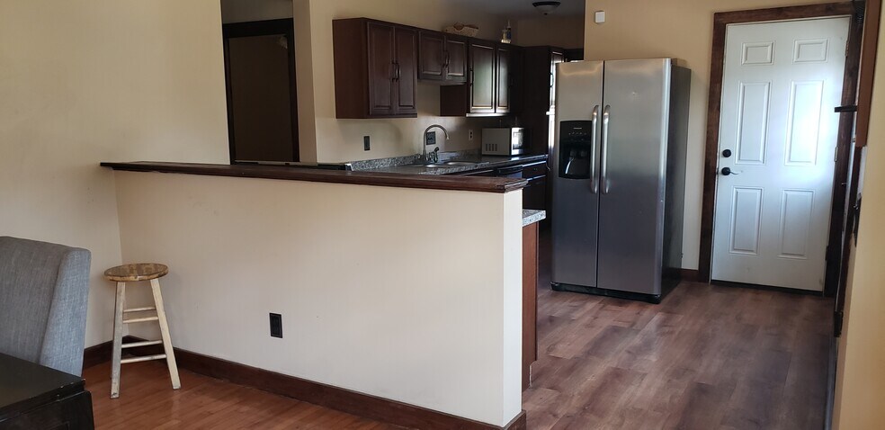 Living room to kitchen - 87 Woodlawn St