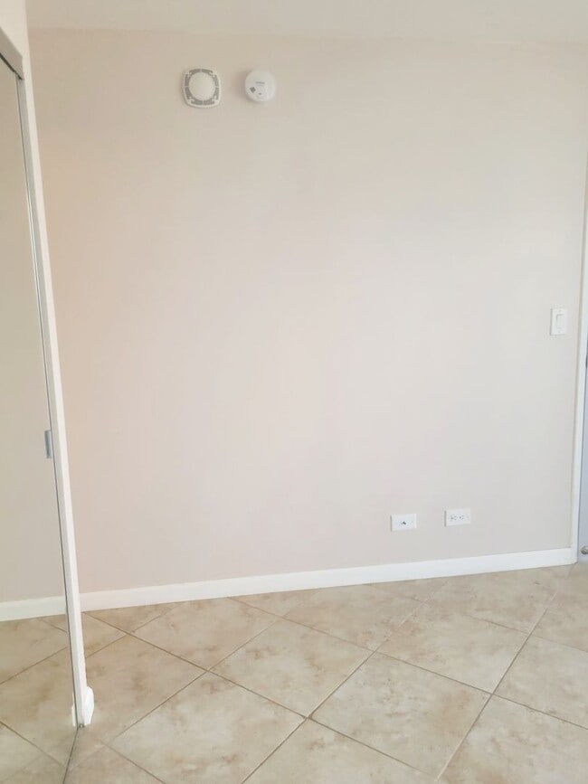 Building Photo - AVAILABLE | 2 Bedroom, 1 Bathroom Condo with 1 Assigned Parking Stall