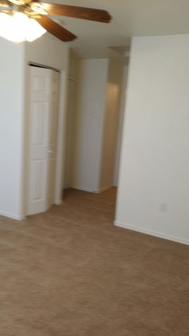 Building Photo - We Pay Referrals - A Move-In Ready Condo!