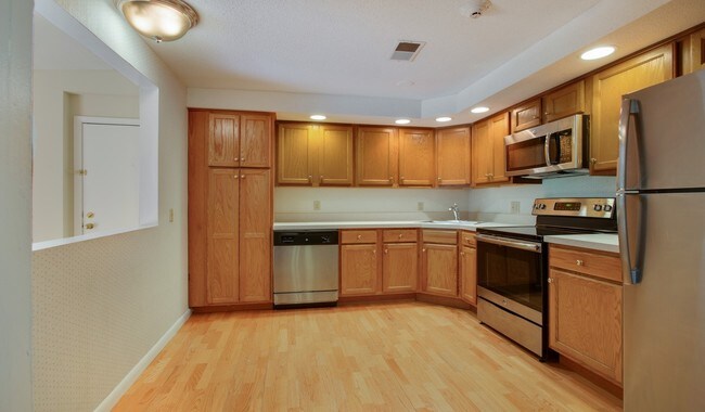 Make cooking easy with great cabinet space and lighting - Royal Crest Estates, North Andover