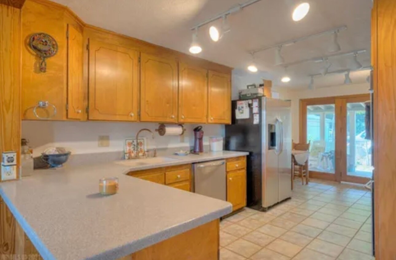 lots of cabinets and storage opening into dining room - 5163 Whitethorne Rd