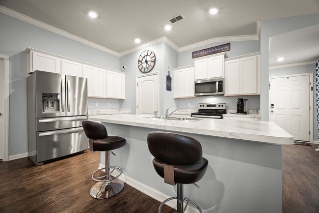 Building Photo - Spacious 4-Bedroom Home with Fenced Yard & Community Amenities – Available June 30th!