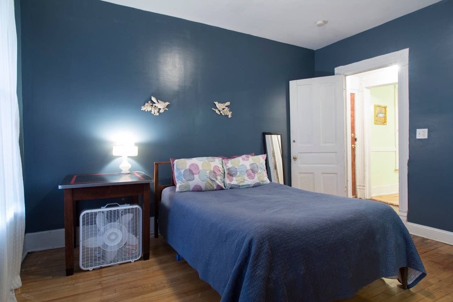 Staged pre-renovation photo of bedroom - 2640 West Thomas Street