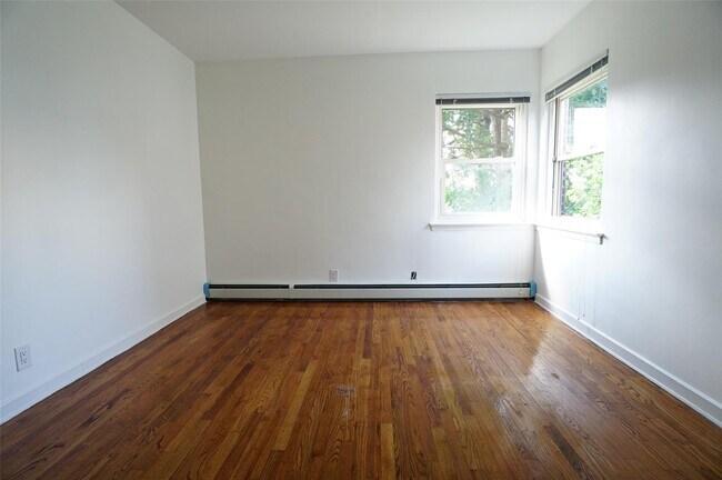 Building Photo - 203-12 42nd Ave