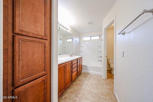 Building Photo - 12848 W Desert Mirage Dr