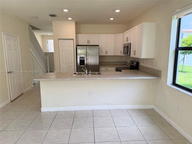 Building Photo - 10623 West 33rd Ct