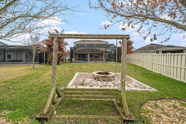 Building Photo - 4BR, 2.5BA home with resort style outdoor living!