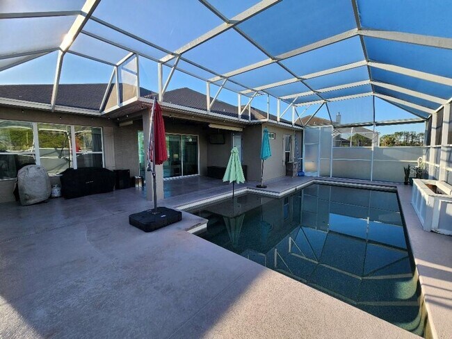 Building Photo - Beautiful Port Orange 4 Bedroom 2 Bathroom Pool Home