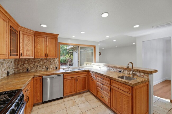 Building Photo - Beautifully Updated 3BR/2BA Home with Private Garden Oasis