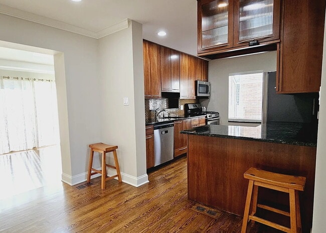 Building Photo - Upscale Living at Its Finest