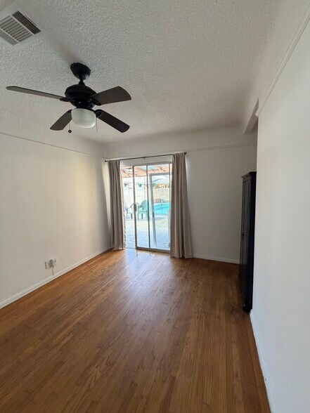 Building Photo - 11021 S Hoover St