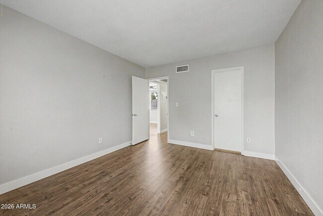 Building Photo - 4554 E Paradise Village Pky N