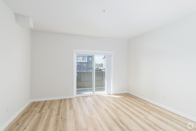 3BR, 2BA - 1,210SF - Living Room - Bonneville Apartments