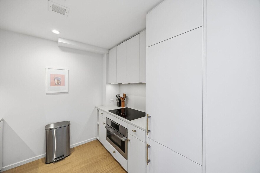 Building Photo - 4-75-75 48th Ave