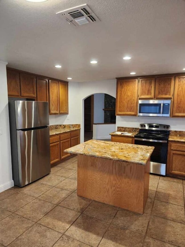 Building Photo - Action Properties RES Inc: offering Single Story, New Paint, Great Room with formal dining area, ...