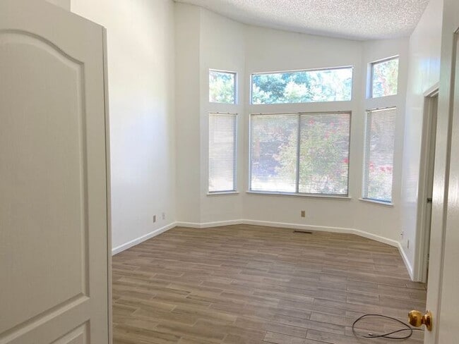 Building Photo - Coming Up Roses - NW Reno 4 Bedroom/3 Car Garage Single Story House