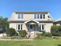 Building Photo - 4916 S Lorel Ave