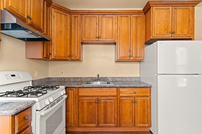 Building Photo - Utilities Included! Bright 1BD w/ Granite Kitchen & Plank Flooring