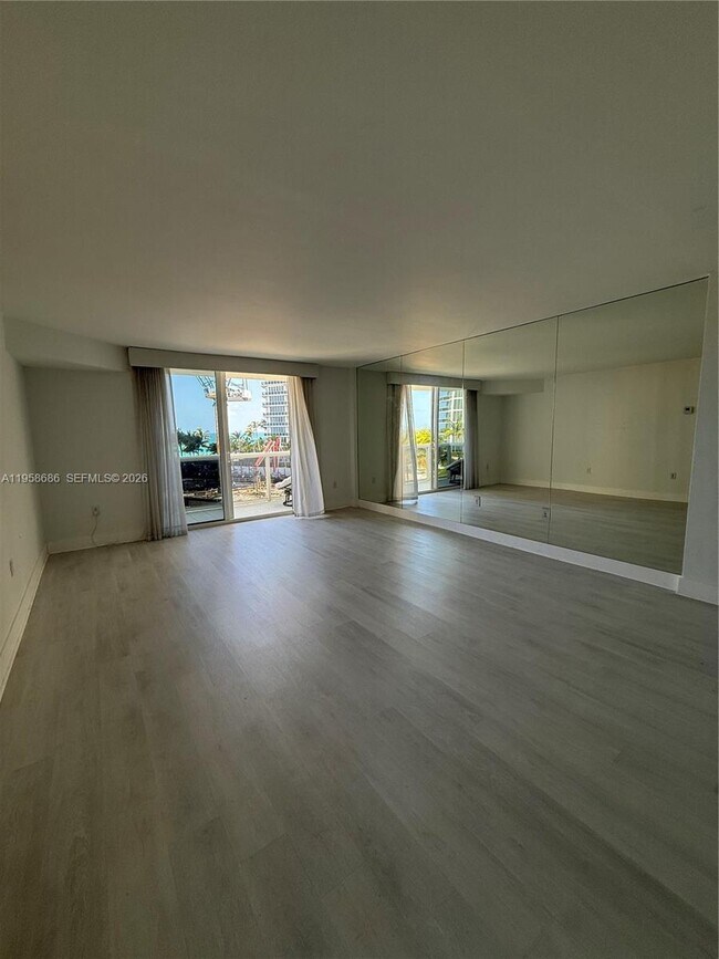 Building Photo - 10275 Collins Ave