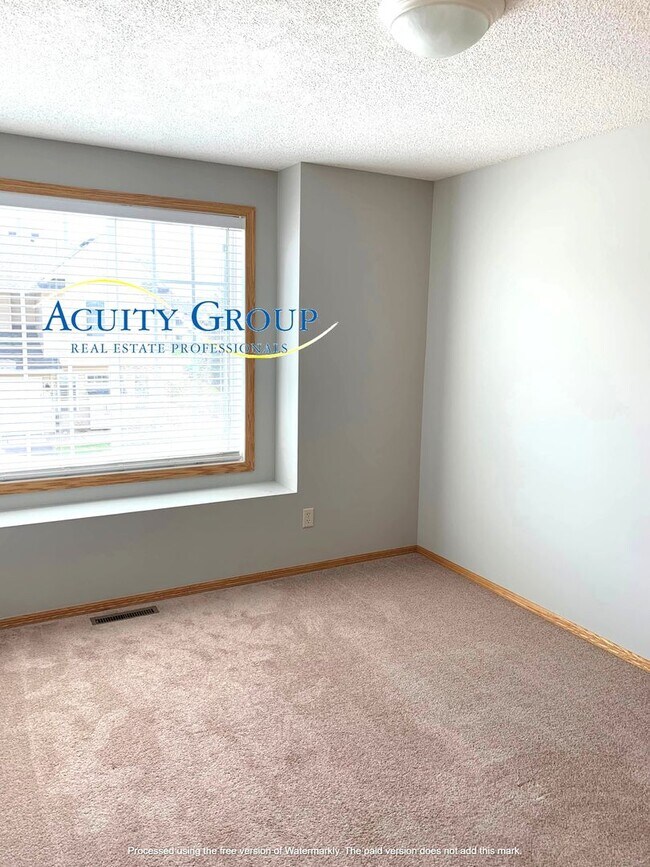 Building Photo - 3BR, 2BA, Champlin Townhome for Move in as soon as 9/1/2026